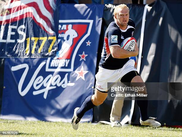 Matt Hawkins of the United States runs in for try against Guyana during the IRB Sevens World Series at Sam Boyd Stadium February 14, 2010 in Las...