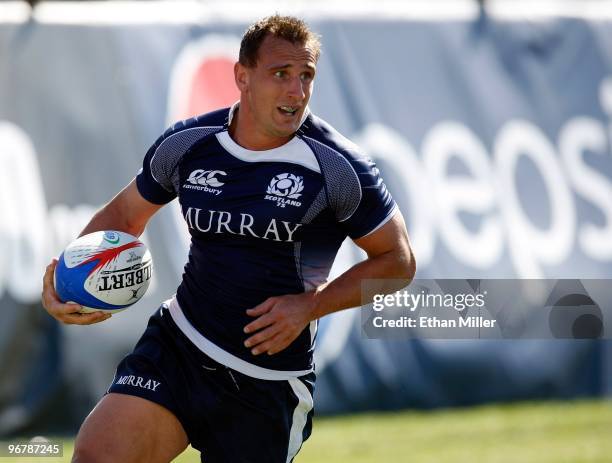 Colin Shaw of Scotland runs with the ball against Argentina during the IRB Sevens World Series at Sam Boyd Stadium February 14, 2010 in Las Vegas,...