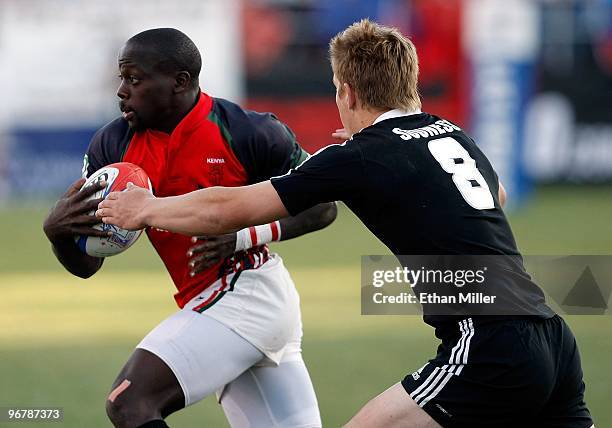 Innocent Simiyu of Kenya tries to get away from Ben Souness of New Zealand during the IRB Sevens World Series at Sam Boyd Stadium February 14, 2010...