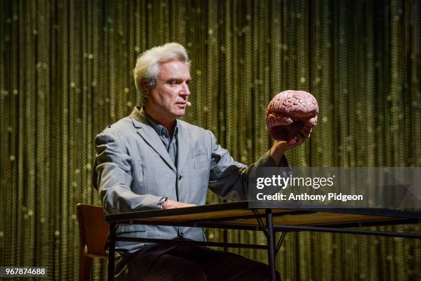 David Byrne performs on stage at Keller Auditorium during his American Utopia tour, May 27, 2018 in Portland, Oregon.
