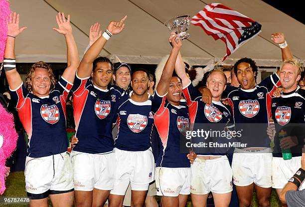 Members of the United States team celebrate their 28-17 victory over France in the Bowl Final match during the IRB Sevens World Series at Sam Boyd...