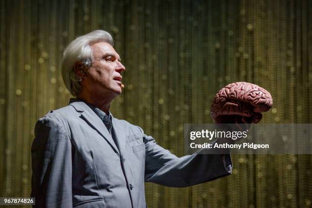 David Byrne performs on stage at Keller Auditorium during his American Utopia tour, May 27, 2018 in Portland, Oregon.