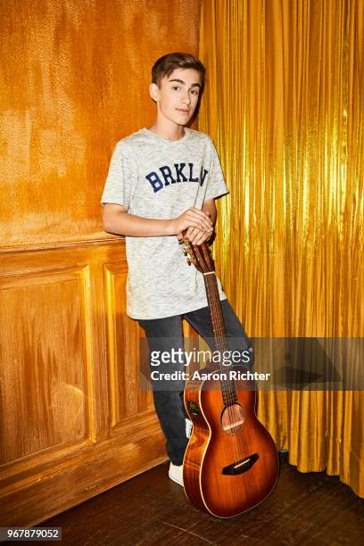 Singer Johnny Orlando is photographed for Tiger Beat Magazine on November 25, 2017 at Sid's Gold Request Room in New York City.