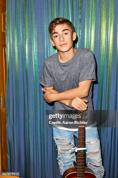 Singer Johnny Orlando is photographed for Tiger Beat Magazine on November 25, 2017 at Sid's Gold Request Room in New York City.