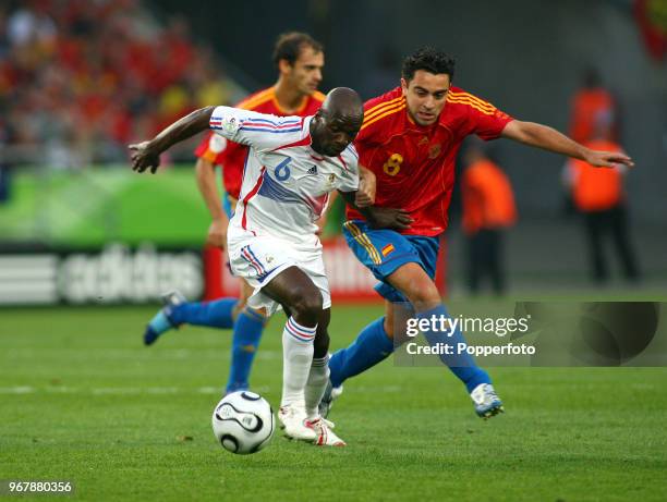 Claude Makelele of France and Xavi of Spain in action during the FIFA World Cup Round of Sixteen at the Stadium in Hanover on June 27th, 2006. France...