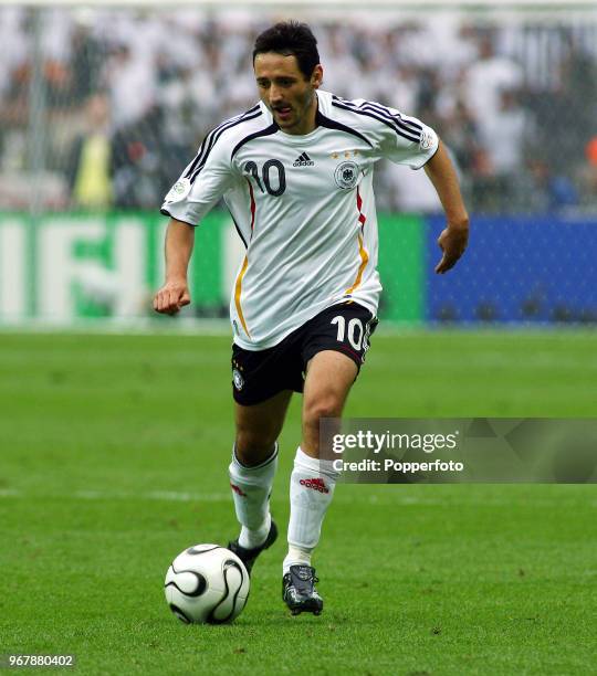 Oliver Neuville of Germany in action during the FIFA World Cup Quarter-final match between Germany and Argentina at the Olympic Stadium in Berlin on...