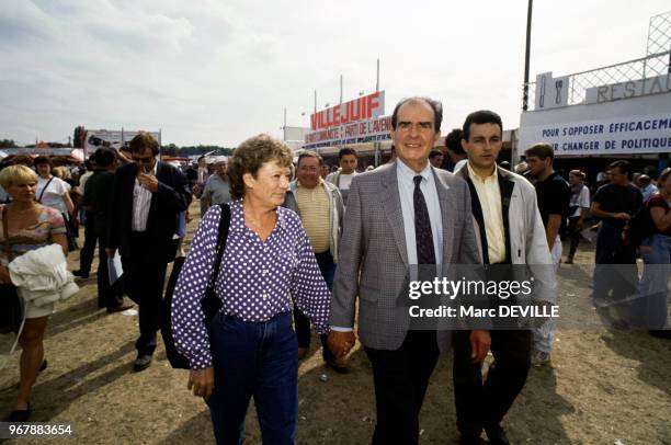 Georges Marchais et son épouse Liliane à la Fête de l'Humanité le 15 septembre 1991 à La Courneuve, France.