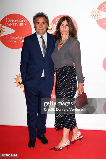 Pietro Valsecchi and Camilla Nesbit attend Convivio photocall on June 5, 2018 in Milan, Italy.