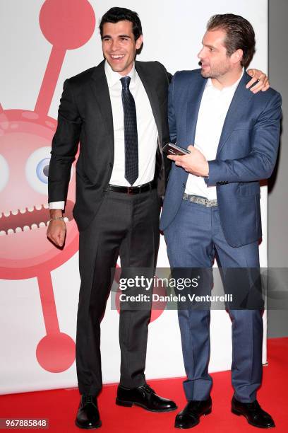 Goffredo Cerza and Tomaso Trussardi attends Convivio photocall on June 5, 2018 in Milan, Italy.