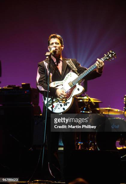 Chris Isaak performs on stage at the Palais Theatre on May 30th 2002 in Melbourne, Australia. He plays a Gibson Chet Atkins guitar.
