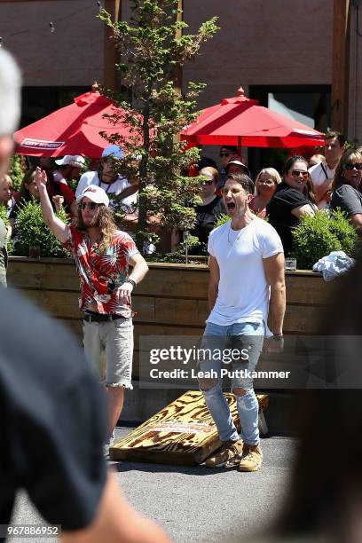 Jaren Johnston and Russell Dickerson compete at Craig Campbell's 6th Annual Celebrity Cornhole Challenge at City Winery Nashville on June 5, 2018 in...