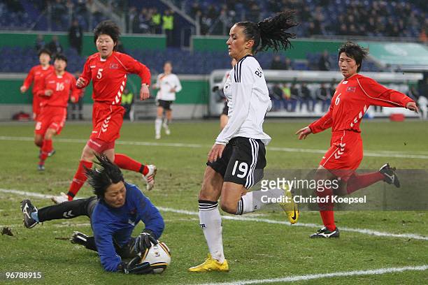 Jon Myong Hui of North Korea saves the ball against Fatmire Bajramaj of Germany during the Women's international friendly match between Germany and...