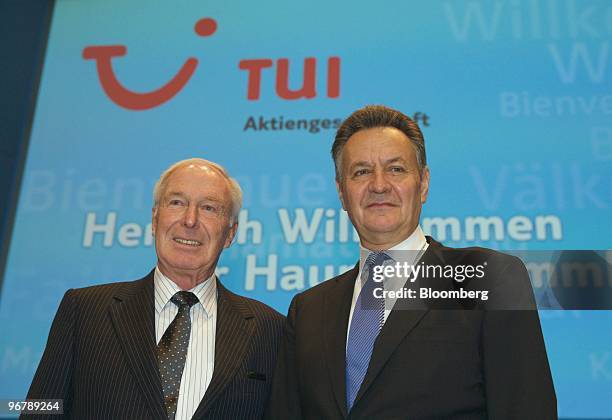 Dietmar Kuhnt, chairman of the supervisory board of TUI AG, left, and Michael Frenzel, chief executive officer of TUI AG, pose during the company's...
