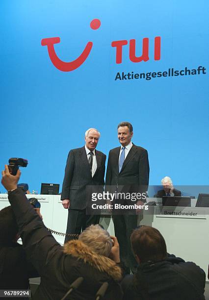 Dietmar Kuhnt, chairman of the supervisory board of TUI AG, left, and Michael Frenzel, chief executive officer of TUI AG, pose during the company's...