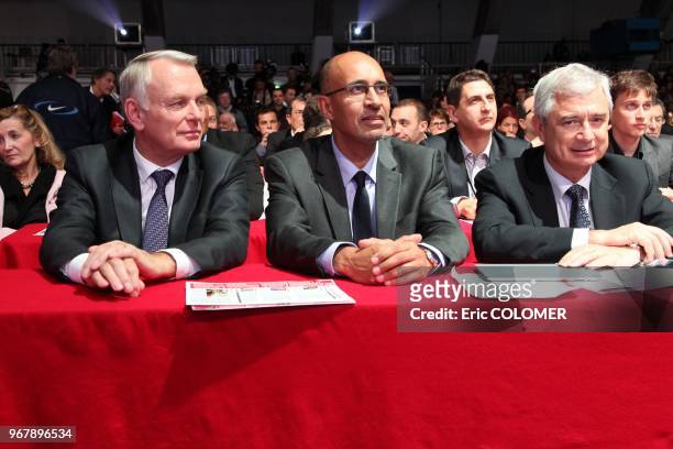 French Prime Minister, Jean-Marc Ayrault sits near French Socialist Party's first secretary, Harlem Desir during the PS national congress on October...