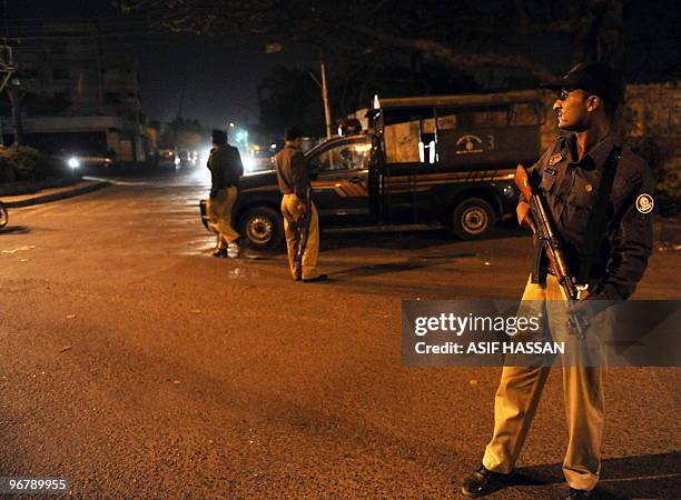 Pakistani policemen keep vigil at a security checkpoint in Karachi on February 17, 2010. Pakistan confirmed on February 17 the capture of the...