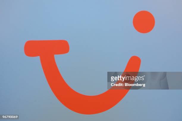 The TUI AG logo is seen in Hannover, Germany on Wednesday, Feb.17, 2010. TUI AG's major shareholder John Fredriksen lowered his stake in the company...