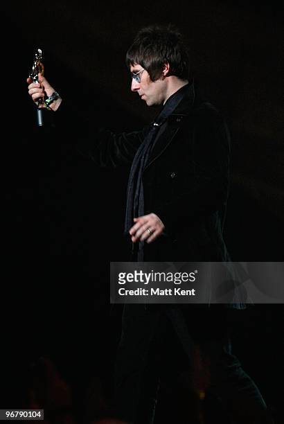 Liam Gallagher formerly of Oasis accepts the award for 'British Album of 30 Years' on stage at The Brit Awards 2010 at Earls Court on February 16,...