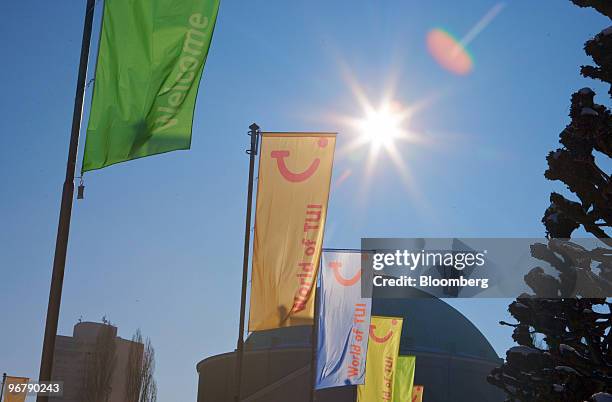 Flags wave outside the Congress Center during the TUI AG annual shareholders' meeting in Hannover, Germany on Wednesday, Feb.17, 2010. TUI AG's major...