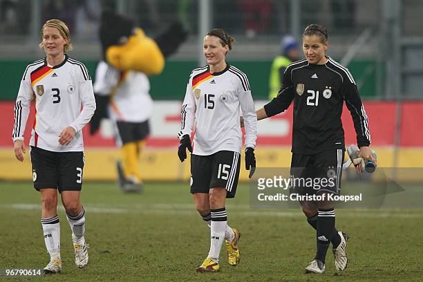 Saskia Bartusiak, Sonja Fuss and Lisa Weiss of Germany celebrate the 3:0 victory after the Women's international friendly match between Germany and...