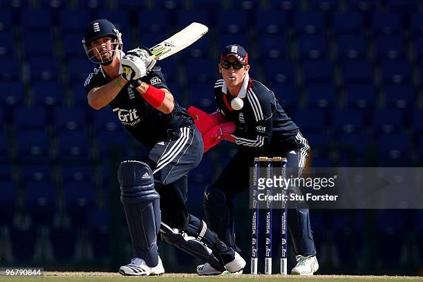 England Lions wicketkeeper Craig Kieswetter looks on as England batsman Kevin Pietersen picks up some runs during the Twenty20 Friendly Match between...