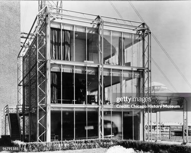 View of the 'Crystal House' at the Century of Progress International Exposition , Chicago, Illinois, 1934. The home's exterior frame and glass walls...