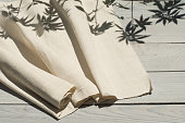 Hemp fabric on a white wooden surface