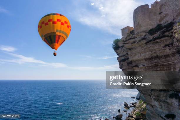 hot air balloon with clear sky at corsica island - balagne stock pictures, royalty-free photos & images