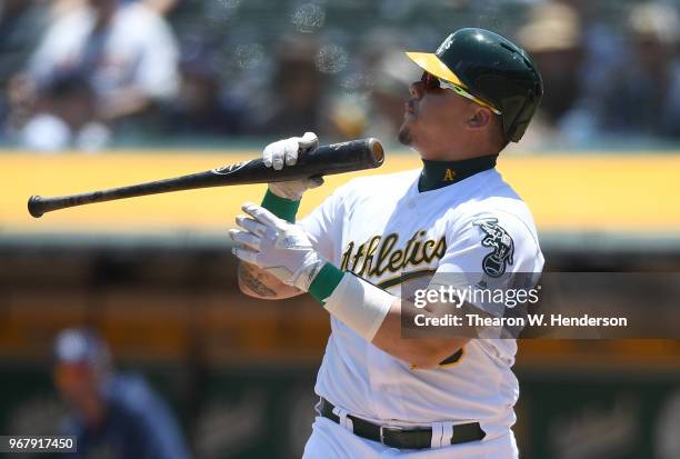 Bruce Maxwell of the Oakland Athletics reacts after striking out against the Tampa Bay Rays in the bottom of the second inning at the Oakland Alameda...