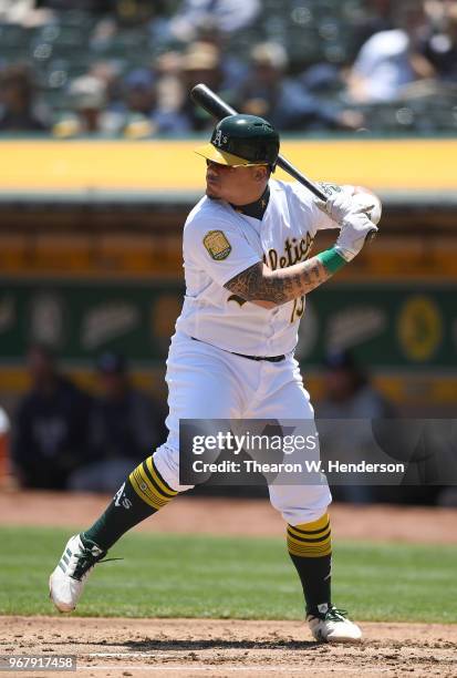 Bruce Maxwell of the Oakland Athletics bats against the Tampa Bay Rays in the bottom of the second inning at the Oakland Alameda Coliseum on May 31,...