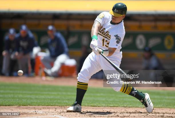 Bruce Maxwell of the Oakland Athletics bats against the Tampa Bay Rays in the bottom of the second inning at the Oakland Alameda Coliseum on May 31,...