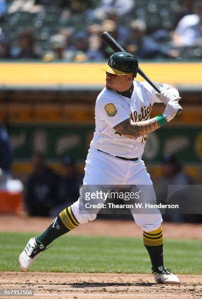 Bruce Maxwell of the Oakland Athletics bats against the Tampa Bay Rays in the bottom of the second inning at the Oakland Alameda Coliseum on May 31,...