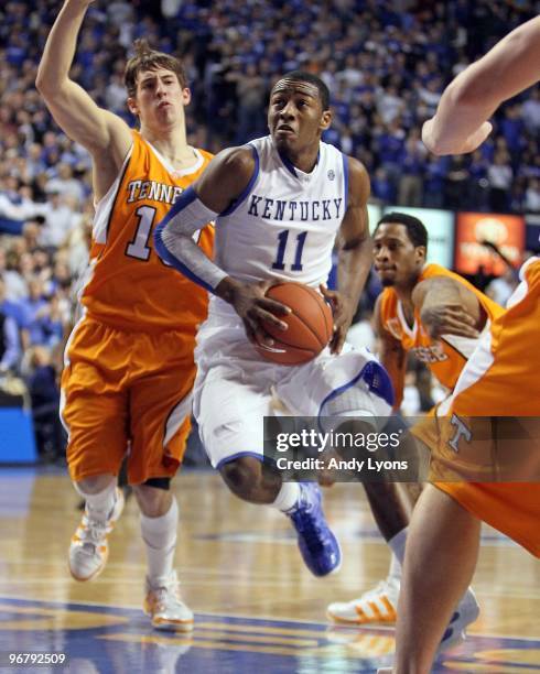 John Wall of the Kentucky Wilcats drives during the SEC game against the Tennessee Volunteers on February 13, 2010 at Rupp Arena in Lexington,...