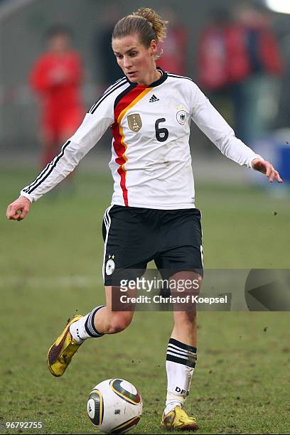Simone Laudehr of Germany runs with the ball during the Women's international friendly match between Germany and North Korea at the MSV Arena on...