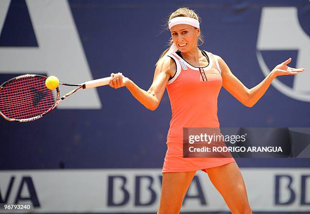 Argentine Gisela Dulko returns the ball to Edina Gallovits from Rumania during the WTA Bogota Tennis Championship on February 17, 2010. Dulko won 6-2...