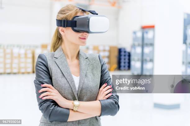 confident businesswoman & flying goggles - flying goggles imagens e fotografias de stock