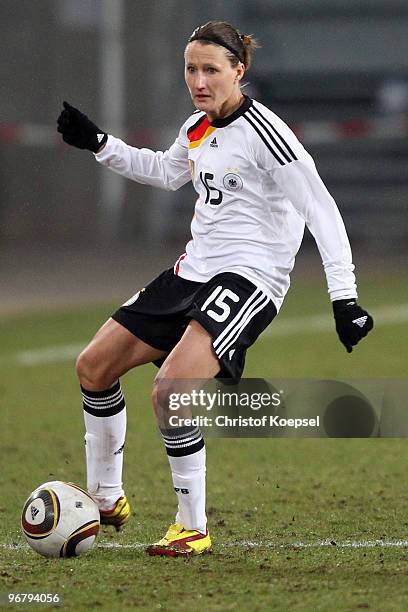 Sonja Fuss of Germany runs with the ball during the Women's international friendly match between Germany and North Korea at the MSV Arena on February...