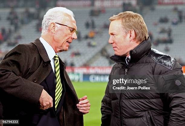 Football legend Franz Beckenbauer and presenter Johannes B. Kerner talk to each other prior to the UEFA Champions League round of sixteen, first leg...