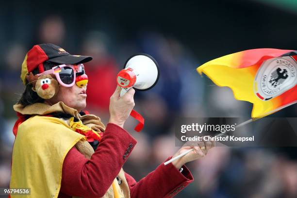 Fan of Germany celebrates during the Women's international friendly match between Germany and North Korea at the MSV Arena on February 17, 2010 in...