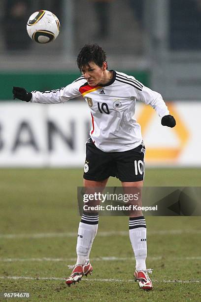 Linda Bresonik of Germany does a header during the Women's international friendly match between Germany and North Korea at the MSV Arena on February...