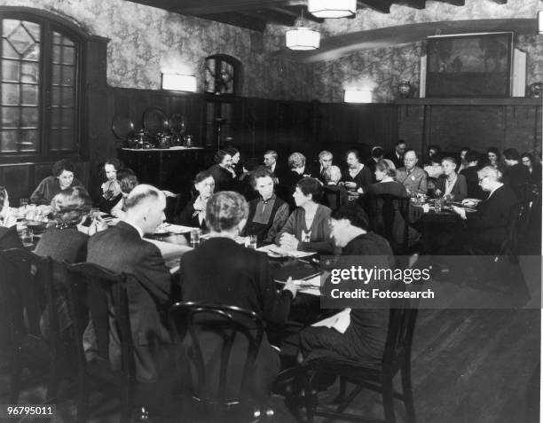 Jane Addams with colleagues at Hull House, circa 1920. .