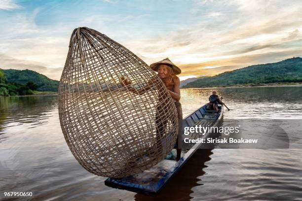 asian river fisherman lifestyle - birds indonesia stock pictures, royalty-free photos & images