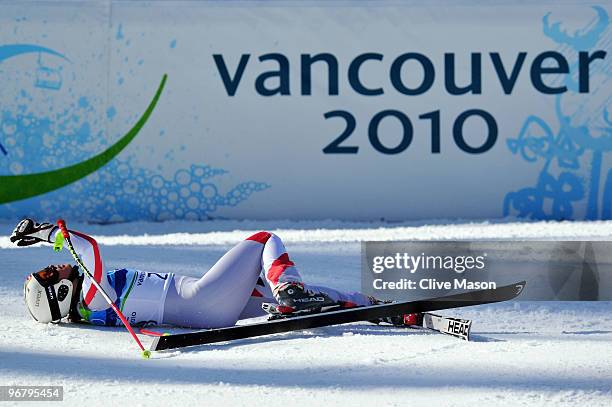 Anna Fenninger of Austria reacts after competing during the Alpine Skiing Ladies Downhill on day 6 of the Vancouver 2010 Winter Olympics at Whistler...