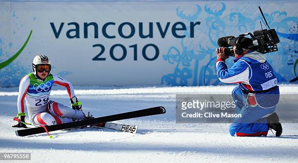 Anna Fenninger of Austria reacts after competing during the Alpine Skiing Ladies Downhill on day 6 of the Vancouver 2010 Winter Olympics at Whistler...