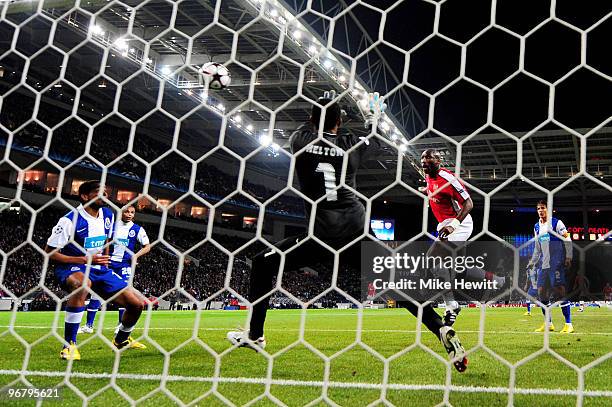 Sol Campbell of Arsenal heads his teams first goal of the game past goalkeeper Helton of Porto during the UEFA Champions League last 16 first leg...