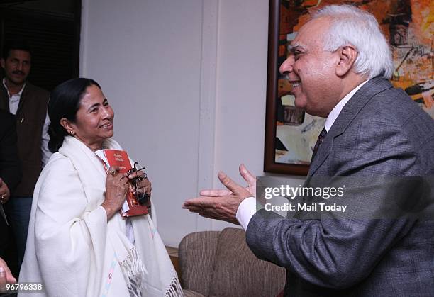 Railway minister Mamta Banerjee with HRD Minister Kapil Sibal during the signing of an Mou between the Railways and the HRD ministry in New Delhi on...