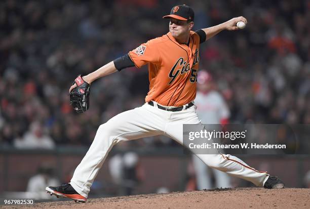 Tony Watson of the San Francisco Giants pitches against the Philadelphia Phillies in the top of the seventh inning at AT&T Park on June 1, 2018 in...