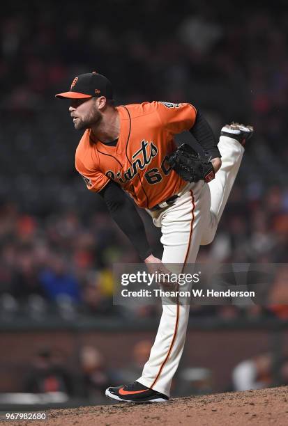 Hunter Strickland of the San Francisco Giants pitches against the Philadelphia Phillies in the top of the ninth inning at AT&T Park on June 1, 2018...