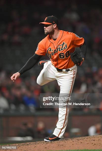 Hunter Strickland of the San Francisco Giants pitches against the Philadelphia Phillies in the top of the ninth inning at AT&T Park on June 1, 2018...