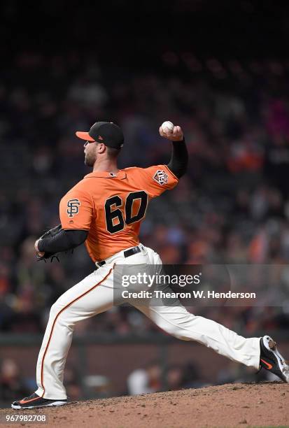 Hunter Strickland of the San Francisco Giants pitches against the Philadelphia Phillies in the top of the ninth inning at AT&T Park on June 1, 2018...